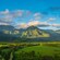 A lush tropical landscape with mountains